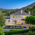 Gated luxury estate in the Conejo Valley at dusk, an example of an off-market style luxury home