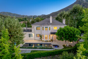 Gated luxury estate in the Conejo Valley at dusk, an example of an off-market style luxury home