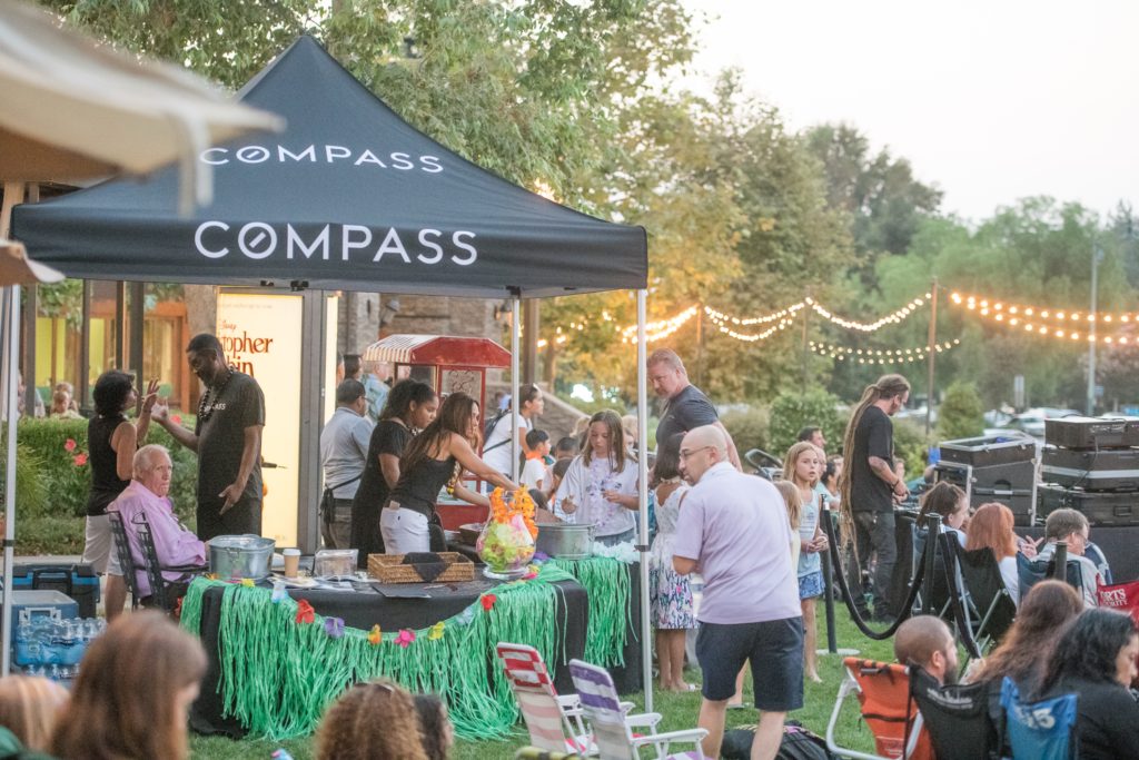 Nicki & Karen Compass Real Estate Booth at The Lakes Movie night on the Lawn in Thousand Oaks
