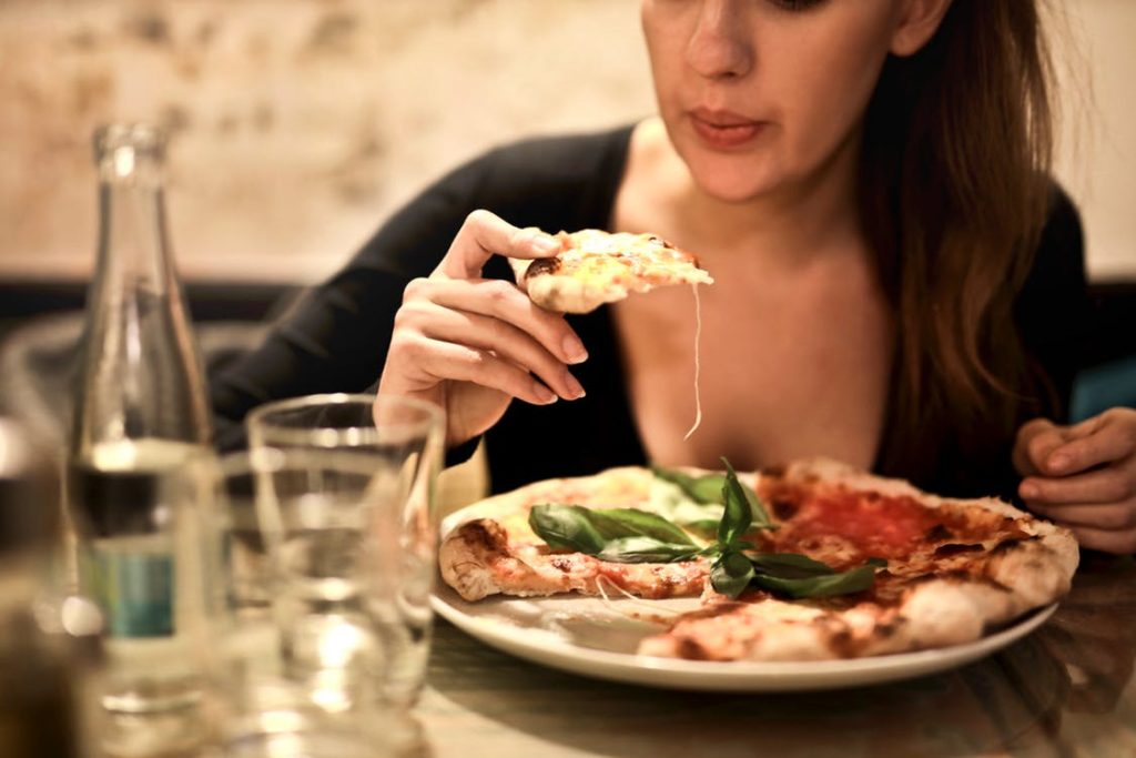 Woman eating Italian Food in Westlake Village
