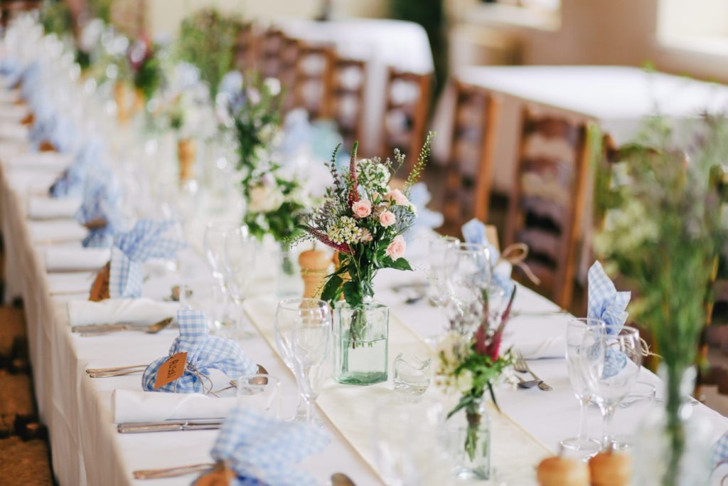 Wedding table set at community center