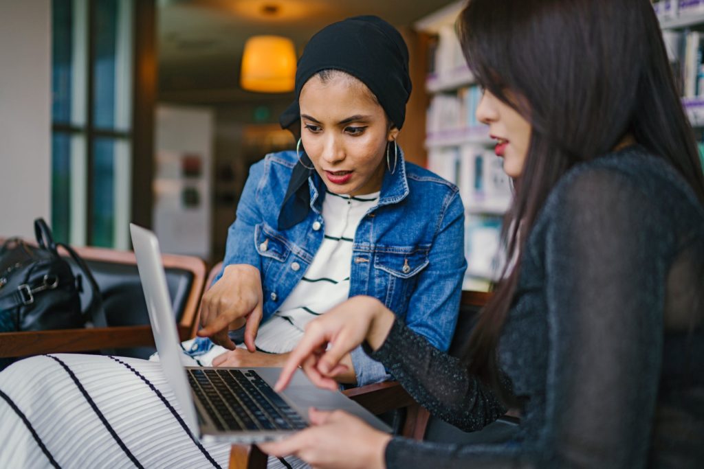 Two women researching an article at the Agoura Hills Library