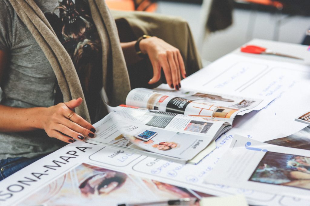 woman reading newspaper