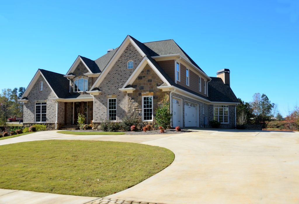 luxury home with blue sky