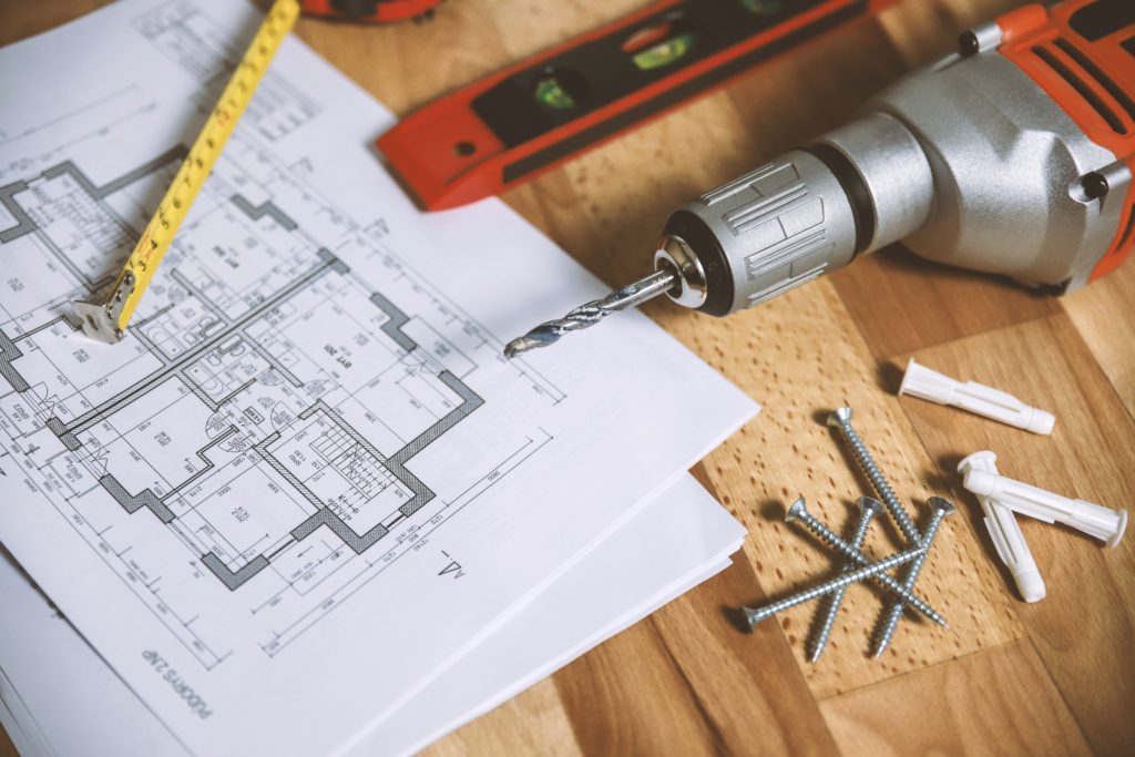 floor plan on table with tools