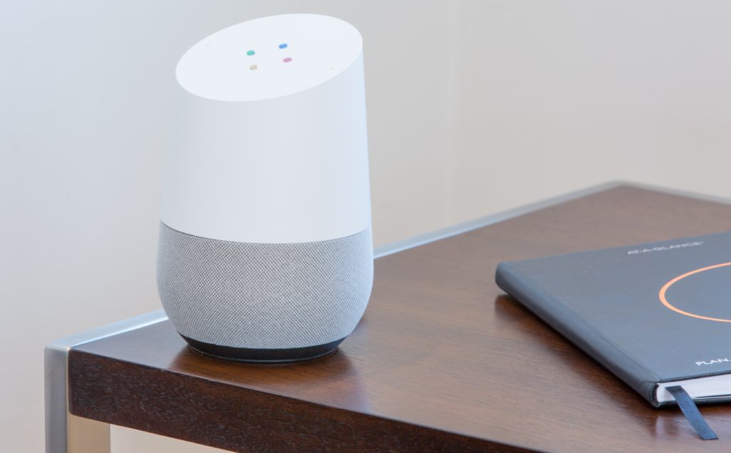 google home on wooden table