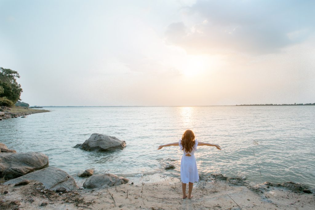 woman in white on beach