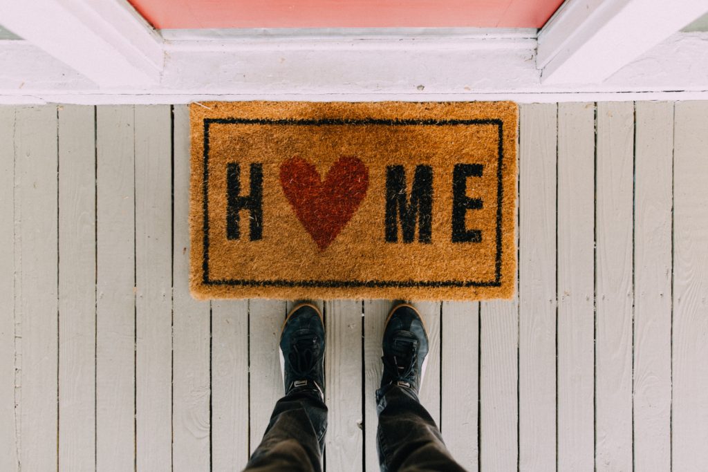 Welcome home mat with heart