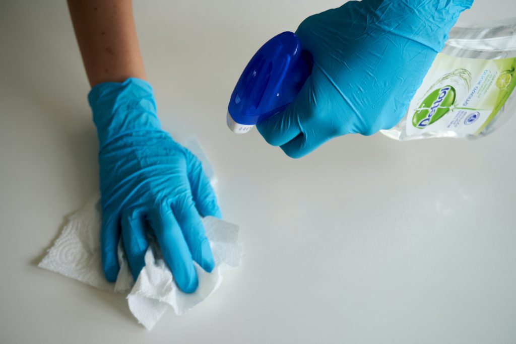 cleaning spray with gloves