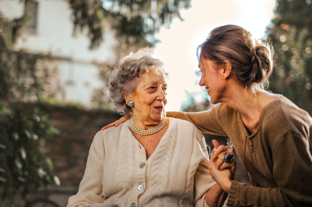 two women talking close together