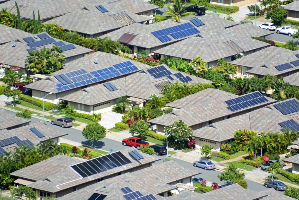 neighborhood with solar panels on roofs
