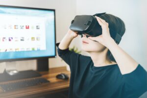 Woman touring a home with VR goggles