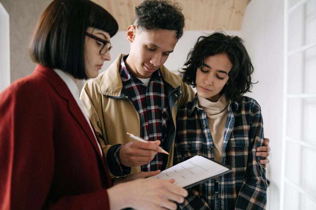 Couple Signing with Single Real Estate Agent