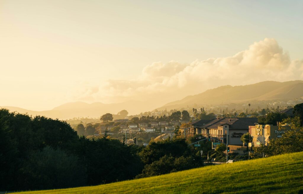 Golden hour view of a suburban Newbury Park style neighborhood nestled below the Conejo Valley hills