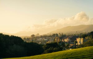 Golden hour view of a suburban Newbury Park style neighborhood nestled below the Conejo Valley hills